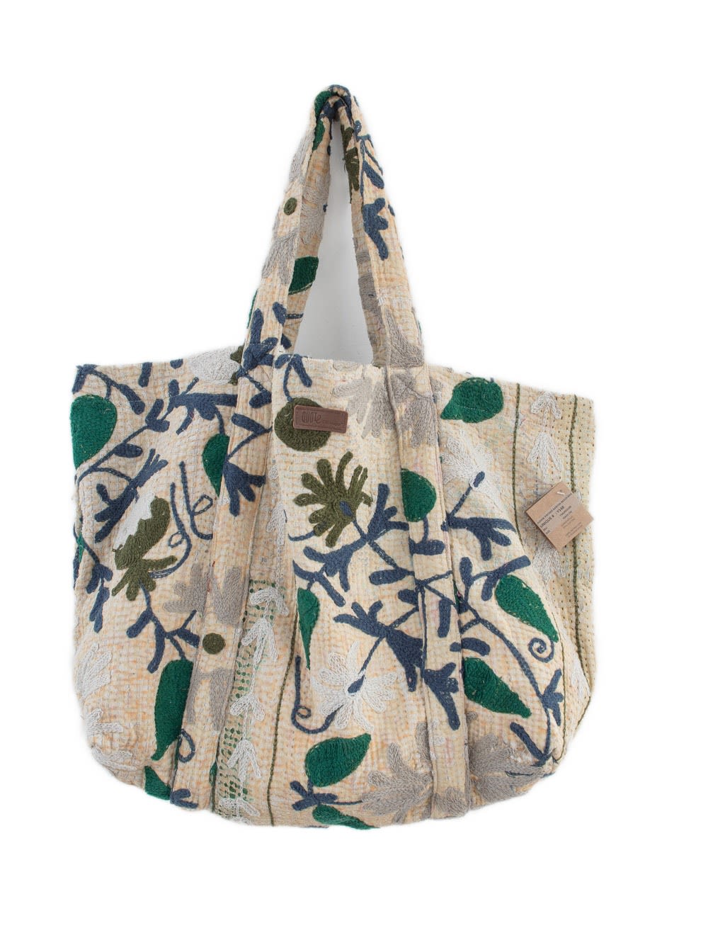 Cremefarvet broderet tote-taske med blåt og grønt blomstermønster og bløde skulderhåndtag